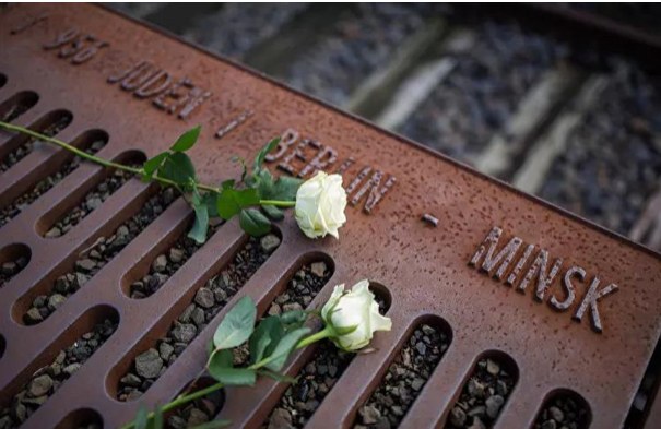Gleis 17 deportation memorial platform in Berlin with white roses